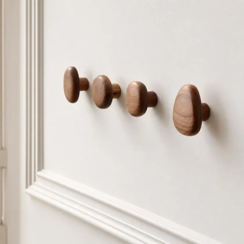 Patère murale ovale en bois foncé style moderne