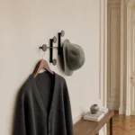 Porte-manteau mural rond noir en métal
