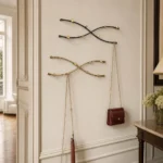 Porte-manteau mural vague croisée noir 8 crochets
